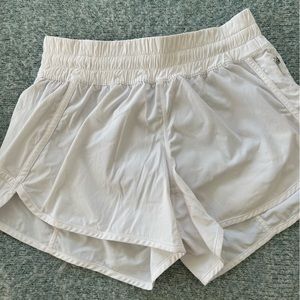 White lululemon shorts size 8, 4 inch.